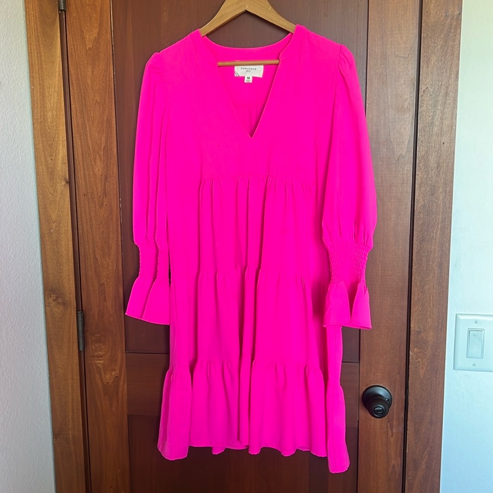 Pomander brand bought on Tuckernuck. Gorgeous bright pink ruched sleeves.